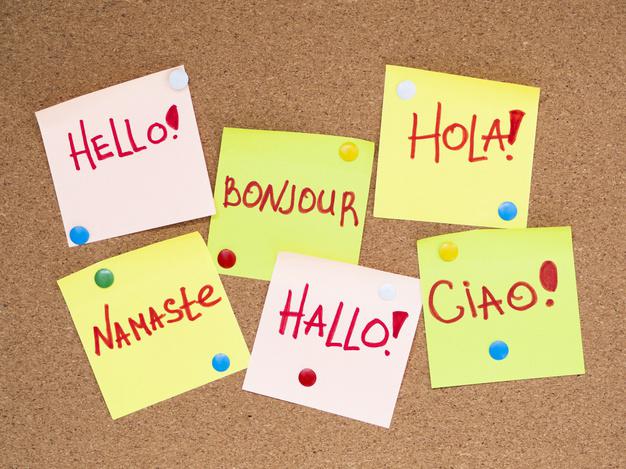 vista-superior-papel-burbujas-discurso-hola-diferentes-idiomas_23-2148293455